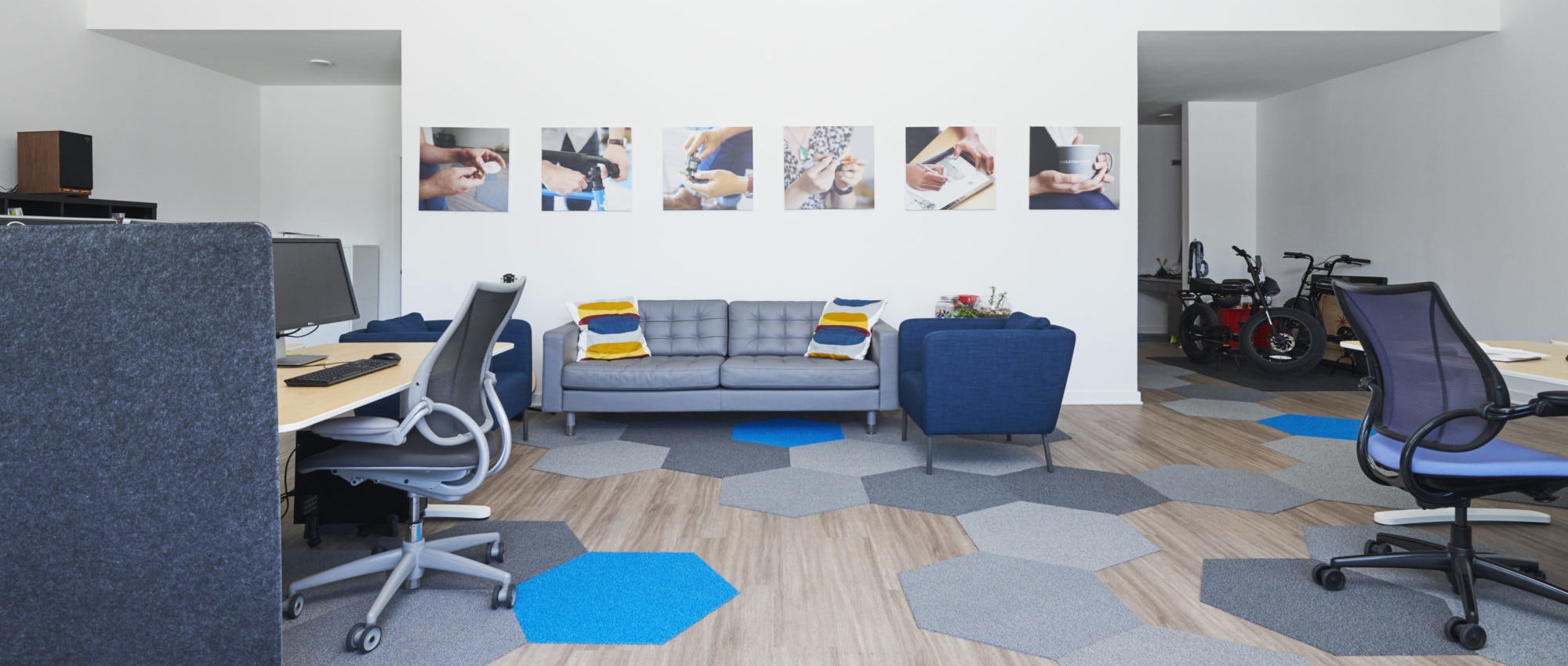 Produktworks Design's studio with hands wall prints