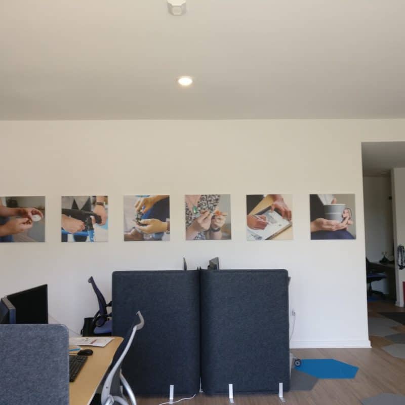Produktworks Design's studio with hands wall prints